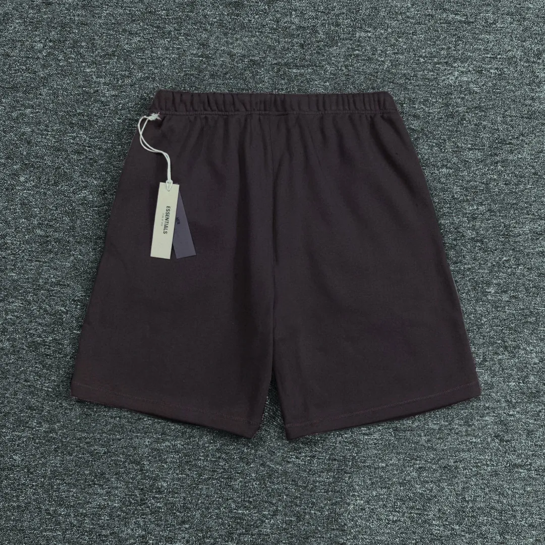 🦋Exclusive for cross-border supply, Hot Sale🦋80 【Purple】Essentials FW 23 Essentials Shorts Smoke Solid color elastic straight American heavyweight casual shorts for men and women Same Style ESSENTIALS was founded in Los Angeles, USA in 2018. The original intention of the establishment was to let more people wear affordable Versatile trendy items. In terms of fabric tailoring, it follows the same comfort and fineness as FEAR OF GOD, and the design is simplified from complexity, with the eye-catching "ESSENTIALS" LOGO running throughout. ESSENTIALS has been favored by fashion enthusiasts since its launch, and many European and American superstars are also its loyal buyers, such as KANYE WEST, JUSITN BIEBER, RIHANNA, etc. . . . . The most popular FOG color on the Internet is here, double-row silicone, the original custom-made fabric is soft and comfortable, no color difference, the custom-dyed rib collar is dyed in the same vat, the original Authentic designated flocking printing factory, there are few machines on the market that can produce a three-dimensional 3D feeling, the width and length of each letter and the 3D depth, etc., the ceiling of the industry, that is to say, you don’t need to look closely to know that it is 3D. In the details, we can see that the size of each corner of the hood is symmetrical and made of double-layer fabric. Factory’s great technology is that it can make each corner symmetrical so that it doesn’t look soft and floppy when worn, and it feels stiff. The original OVERSIZE version is full of high street style. Color: Light Black, Haze Blue, Plum, Seal Gray Size: XS-XL (maximum weight) Recommended: Same Style for men and women